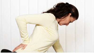 Почему болит спина в пояснице слева у женщин